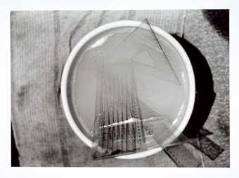 Black and white images of figures and rulers.