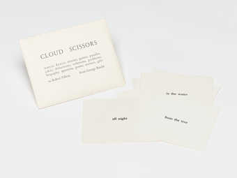 (.1) A white envelope with black print containing (.2 - .8) 7 score cards.