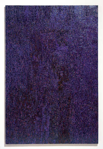 strips of newspaper attached to a bed sheet and colored with dark blue and orange ink.