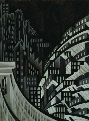 Bridge in foreground with city skyline in background.