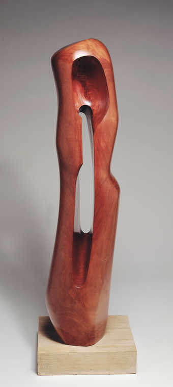 wood form with center opening screwed to wood base