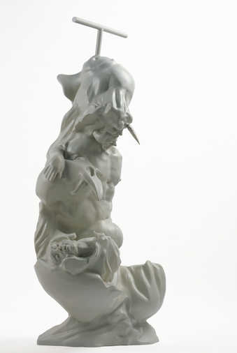 A gray figural sculpture