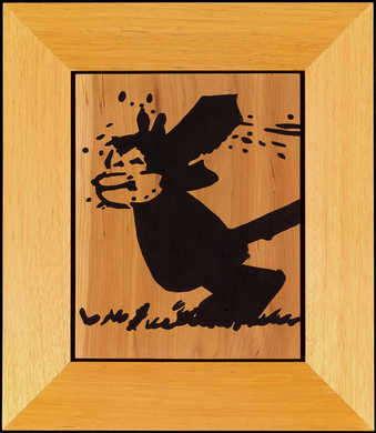 animal standing in grass all in black on unfinished wood.   From a series of 13.