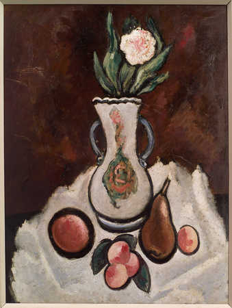 Fruits and a flower in a vase on a white drape in gront of a reddish brown background.