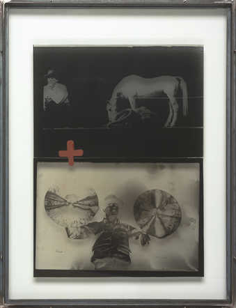 a photographic film  negative and a photographic film positive between two sheets of glass...