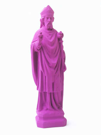A small statue of St. Nicolas, painted purple