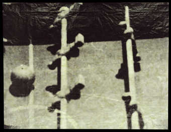 One of four variations of the same image printed in four colors (gray, gold, blue and green) on...