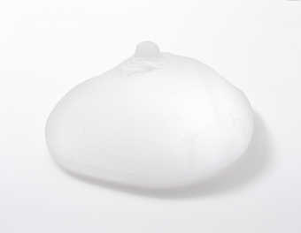 A cast glass woman's breaset