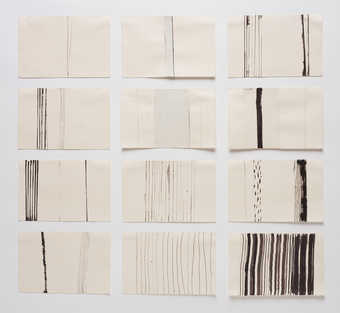 black vertical lines on sheets of paper