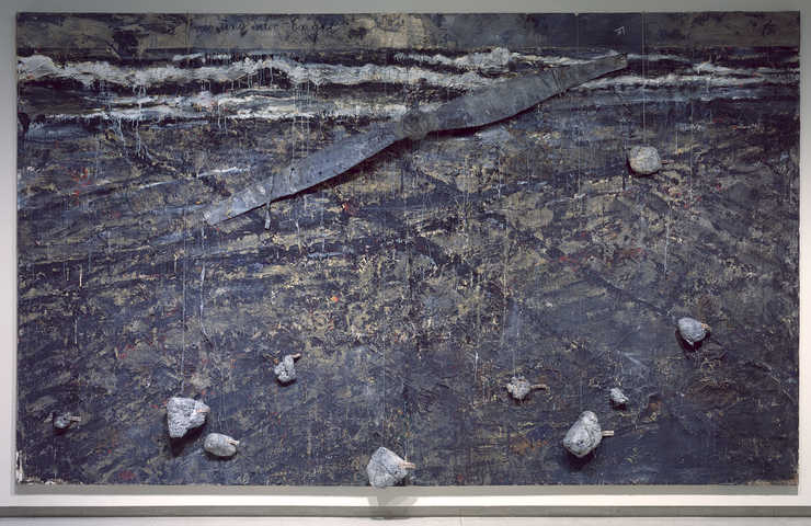 Beach scene in background. Hanging in front of beach are 9 lead stones suspended on wire and a...